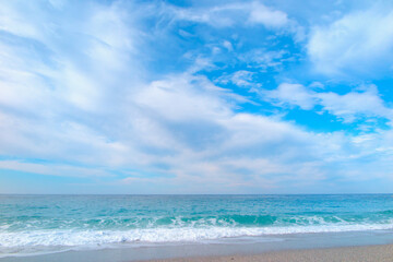 Clouds in blue sky over the sea