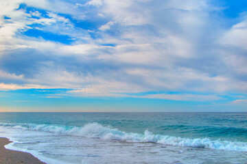 Clouds in blue sky over the sea