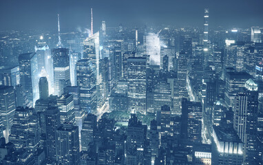 Aerial view of Manhattan at hazy night, color toning applied, New York City, USA.