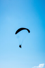 paragliding flight in the mountains. Le Grand-Bornand, France