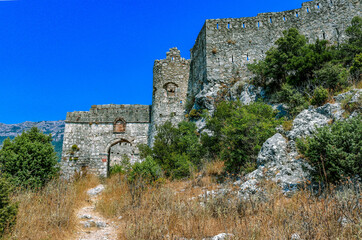 Ruins of the ancient Roman fortress Hai-Nehai in Montenegro, the city of Sutomore. The mountains. Ancient walls.