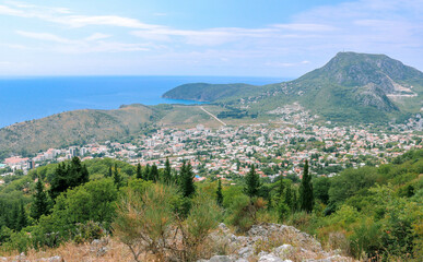 Fototapeta na wymiar View from the top of the mountain to the Balkan city of Sutomore and the Adriatic Sea. Montenegro.
