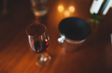Sommelier pours a glass of red wine for a tasting.