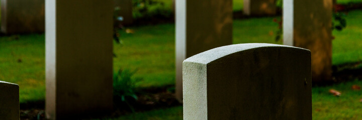 concrete graves on cementery rest in peace