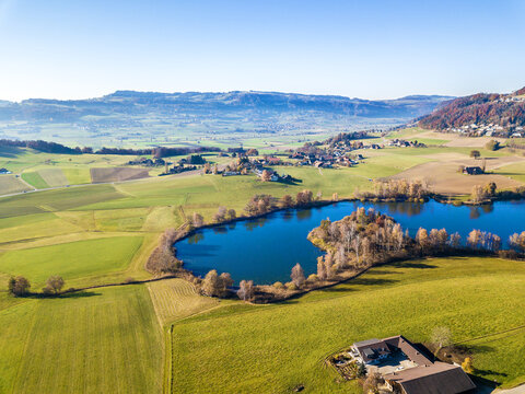 Aerial image of Gerzensee lake in autumn season, Bern Oberland, Switzerland