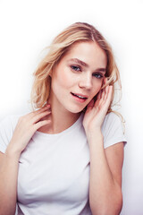 young pretty stylish blond hipster girl posing emotional isolated on white background happy smiling cool smile, lifestyle people concept