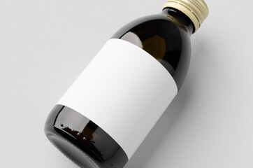 Cold brew coffee glass bottle mockup with blank label. Closeup.