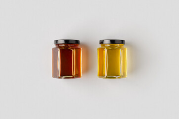Hexagonal honey jars mockup. Two different colors.