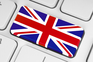 Button with Great Britain flag on white computer keyboard