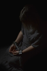 woman hands bound prisoner in room,hands bound