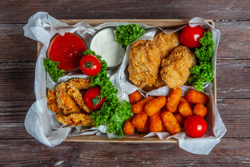 Business lunch in paper container ready for delivery. Top view. Office Lunch boxes with food ready to go. Food takes away. 