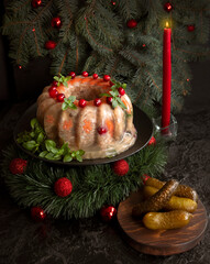 Homemade delicious jelly meat on the festive Christmas table. Perfect cold meat, aspic, galantine with carrots. Russian cuisine - 469973420