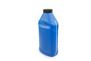 Blue measuring bottle with black lid. Brake fluid.