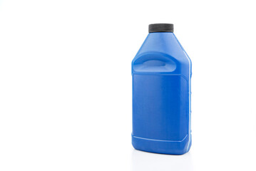 Blue measuring bottle with black lid. Brake fluid.