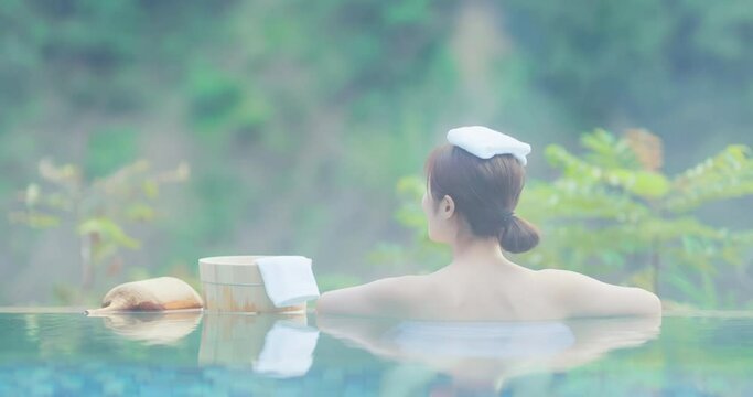 woman relax in hot spring