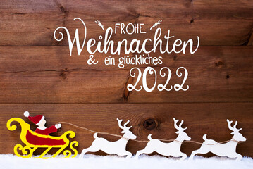 Fototapeta na wymiar Ornament, Snow, Sleigh, Reindeers, Satna, Glueckliches 2022 Means Happy 2022