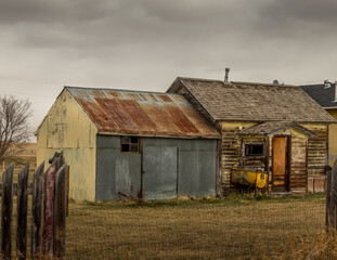 Rustic sheds in a field Ensign Alberta Canada