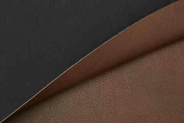 brown artificial leather with waves and folds on PVC base