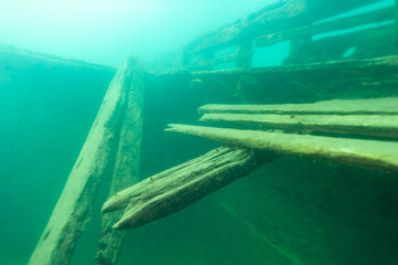 Damaged cabin trunk of the wooden schooner shipwreck the Bermuda - obrazy, fototapety, plakaty