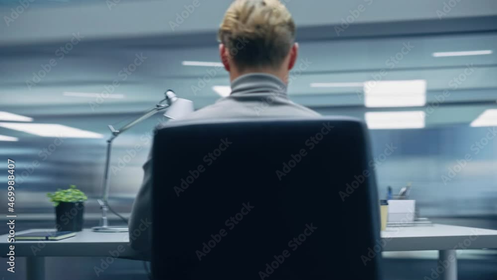 Poster 360 degree modern office: handsome businessman sitting at his desk working on a laptop computer. man