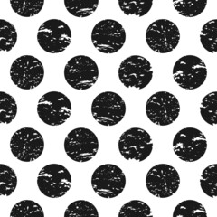 Seamless grunge pattern of little black dots or spots on white.