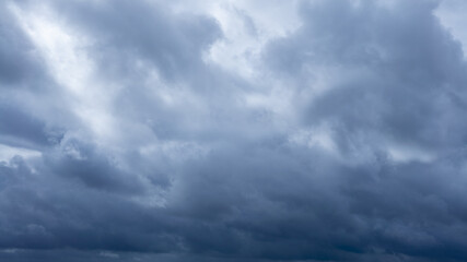 Fototapeta premium Dark storm clouds make the sky in black. Rain is coming soon. Nature background.