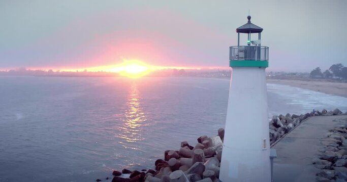 Aerial View Of  harbour and lighthouse at sunset in Santa Cruz, california