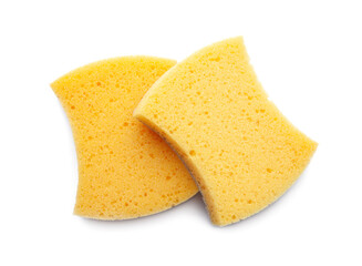 Yellow sponges for cleaning isolated on white background. Cleaning equipment. Plastic scourers for dishes