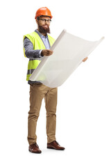Full length shot of a site engineer holding a blueprint and wearing a helmet