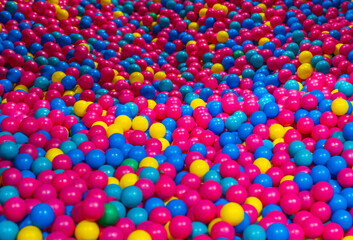 Fototapeta na wymiar Beautiful view of with plastic balls indoor playground in activity center. Sweden.