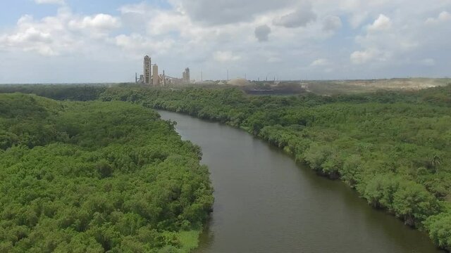 Aerial view of Iguamo River and the cement company, San Pedro De Macor&iacute;s, Dominican Republic. Toma a&eacute;rea R&iacute;o Higuamo San Pedro de Macor&iacute;s, Rep&uacute;blica Dominicana