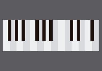 Teclado de un piano en fondo gris.
