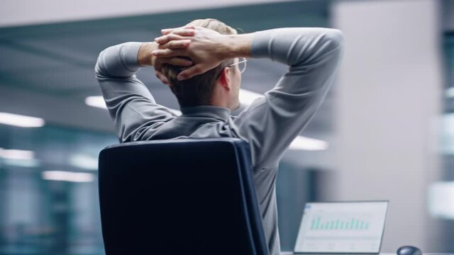 360 Degree Office: Businessman Sitting at His Desk Works on Laptop, Loses on Money Stock Market Emotionally Reacts, Disappointed. Business Entrepreneur is Mad, Suffers Bad Loss. Tracking Around Shot