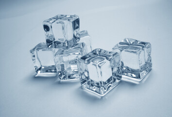 ice cubes on the glass background