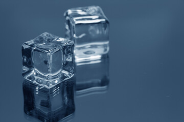 ice cubes on the glass background