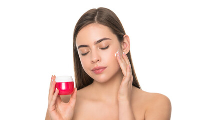 cleansing scrub. presenting female cosmetic product. woman applying face cream.