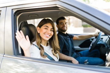 Hispanic couple starting a road trip