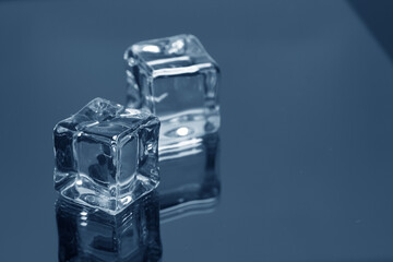 ice cubes on the glass background
