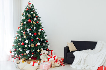 Christmas tree with gifts for the new year 2022