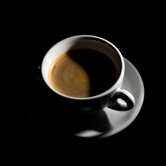 cup of coffee on black background