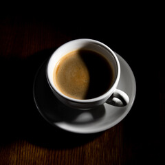 cup of coffee on black background
