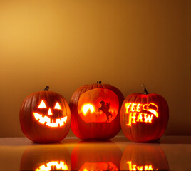 Halloween Pumpkin Carvings with Cowboy Themes - Powered by Adobe