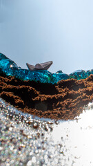 paper boat in the can