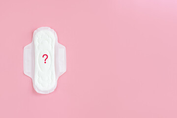 Сlean feminine sanitary napkin with question mark. Absence of menstruation in woman. Minimal...
