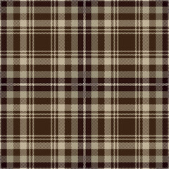 Brown and beige tartan plaid. Scottish pattern fabric swatch close-up. 