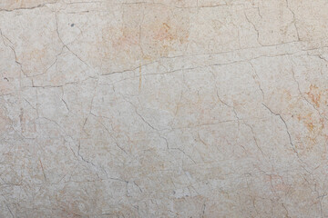 background and texture of cream colored marble stone with veins