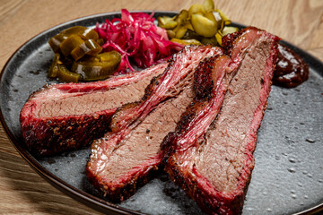 hot appetizer cuts of smoked beef with pickled vegetables american food