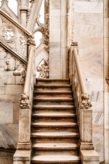 Carved marble staircase with a figured balustrade on the roof of the Duomo. Italy, Milan