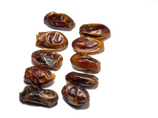 Dates on a white background. Delicious dried fruits.
