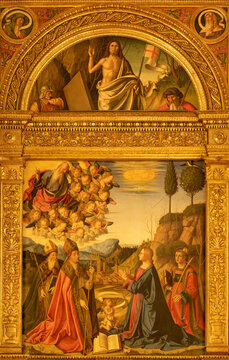FORLÍ, ITALY - NOVEMBER 11, 2021: The paiting of Immaculate Conception and the saints and Resurrection of Jeus in the church Basilica San Mercuriale by Marco Palmezzano (1510).